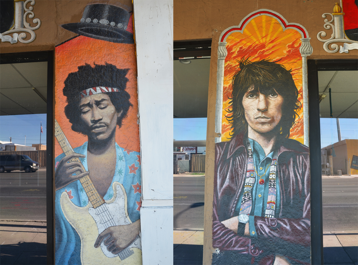 portraits of two guitar players painted on the outside of a store, Jimii Hendrix playing a white guitar and Keith Richards standing with his arms folded. 