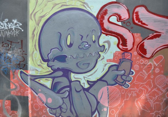 a purple boney creature street art painting on a wall in a lane in Melbourne