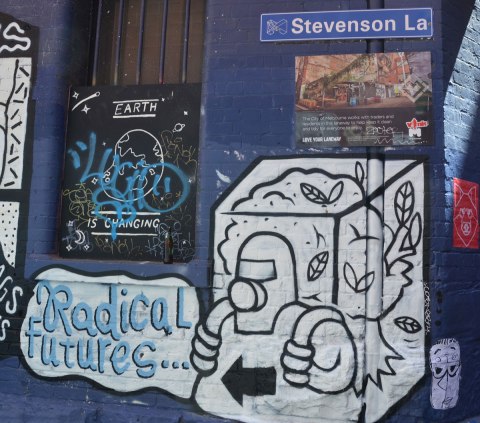 radical futures, part of a series of drawings, this is the title frame, man in gas mask carrying a clear cube box on his back. In the box is a tree with leaves on it. 