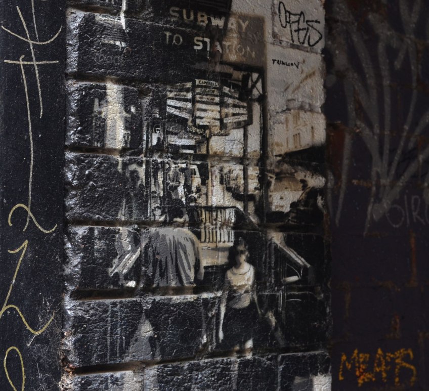 black and white graffiti of a man and a woman walking towards a building with a sign over it that says subway to station