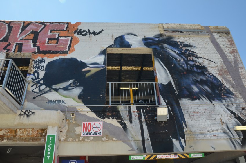 street art of a bird in flight