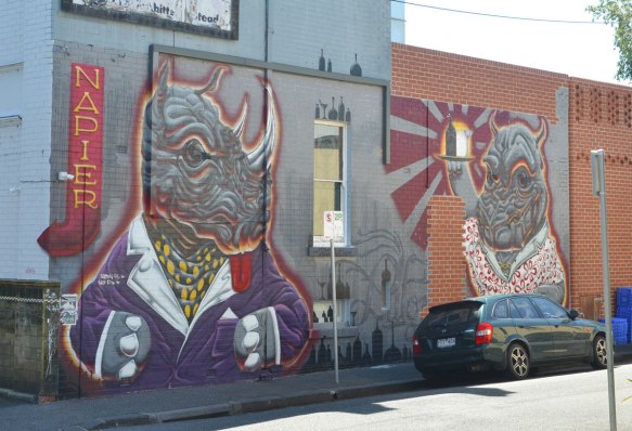 rhinos mural by putos on the side of the Napier Hotel.