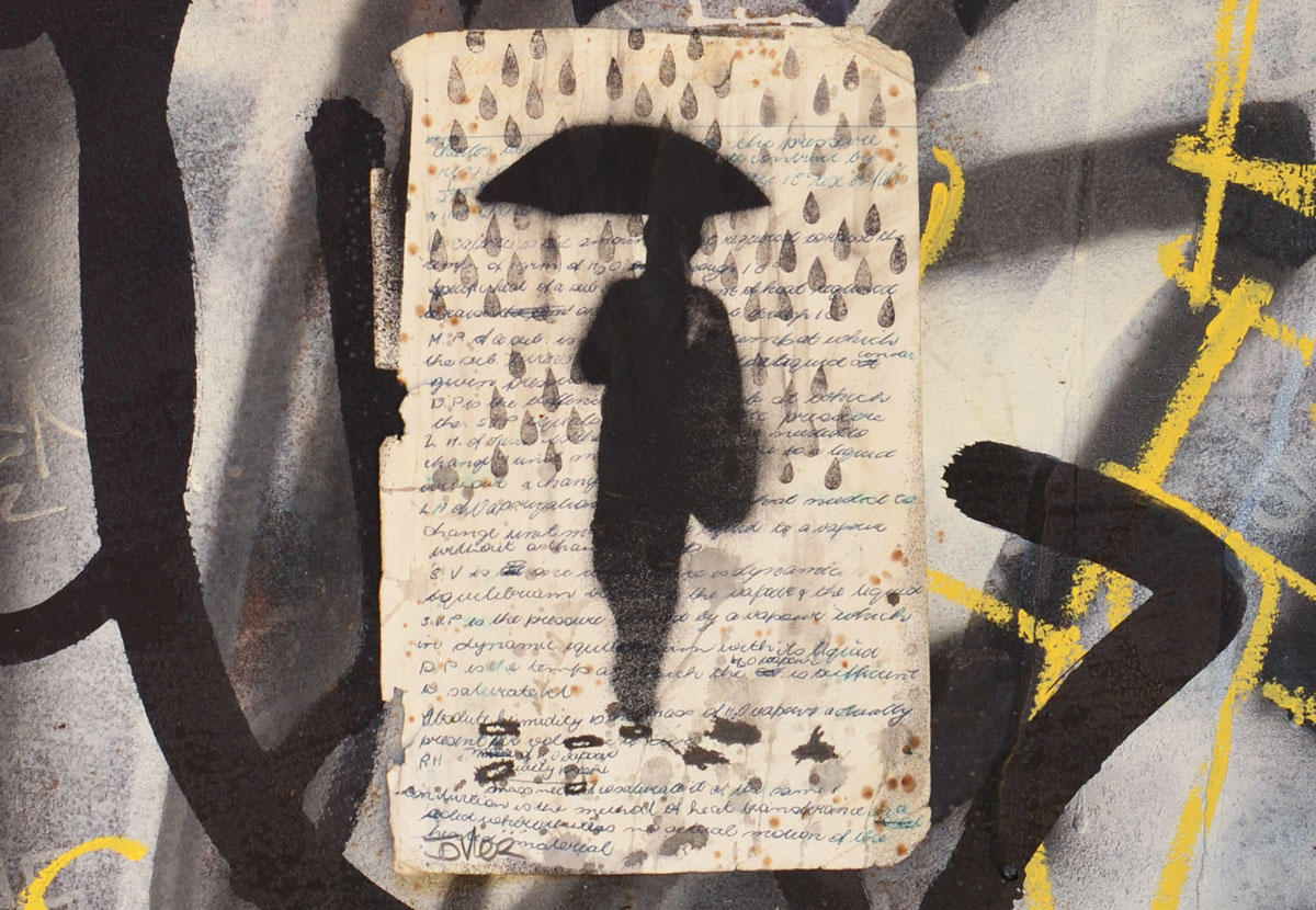 paste up of a black silhouette of a man holding an umbrella and walking through large rain drops.  