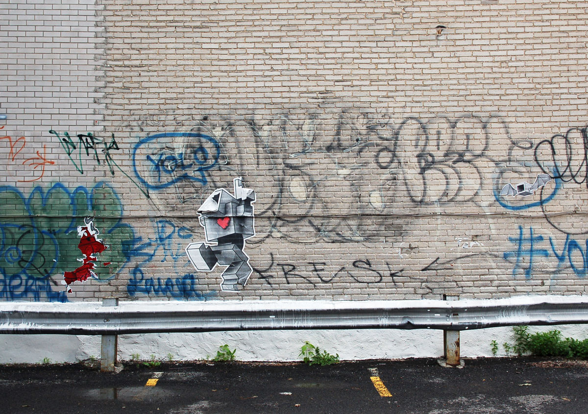 wheatpaste lovebot walking, with small lovebat? or baby bot with bat wings, flying behind