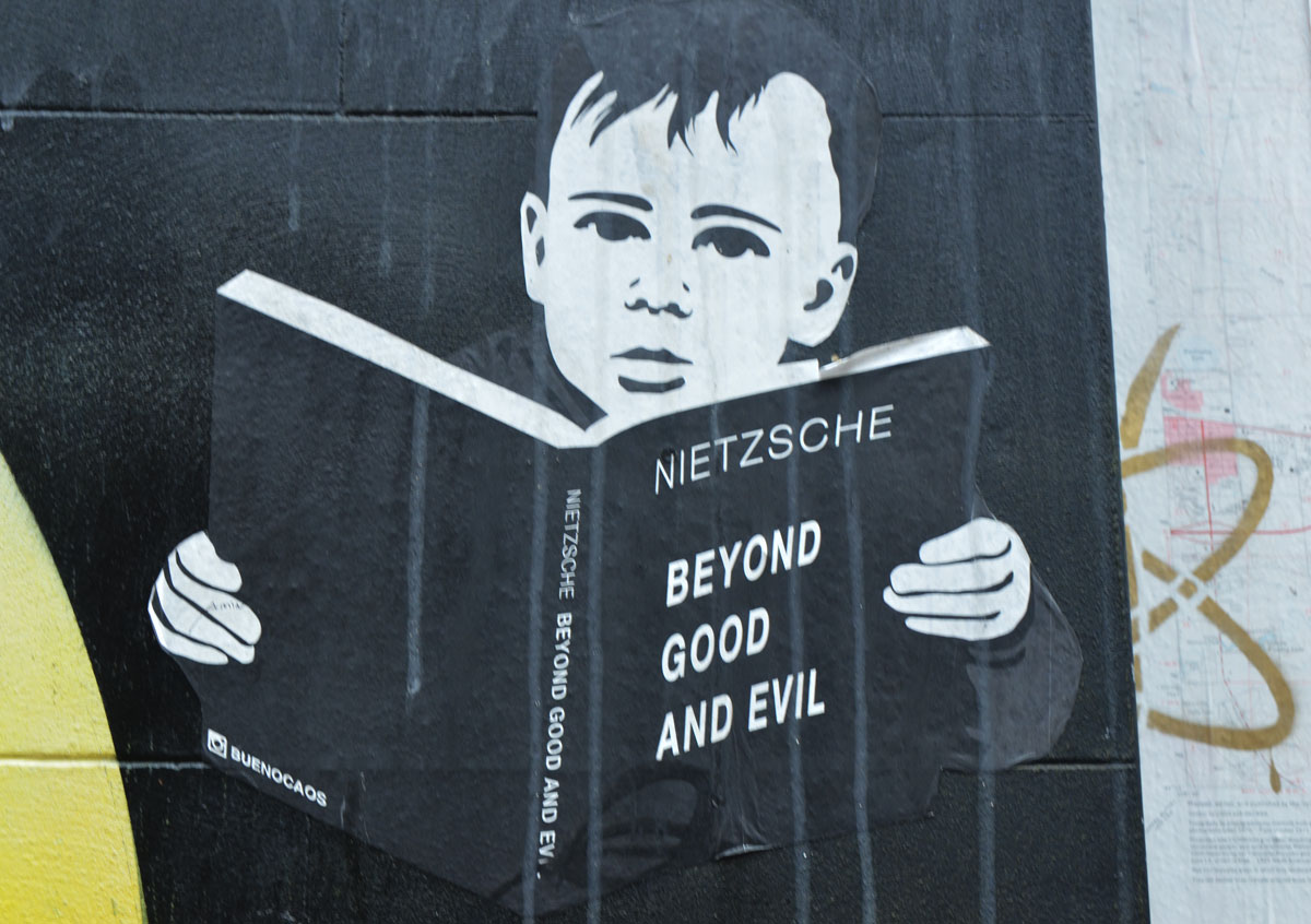 a paste up of a boy reading a book, Neitzsche's Beyond Good and Evil