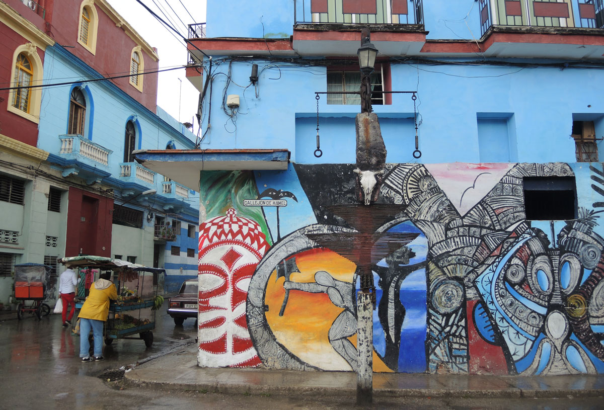 colouful mural on a blue building in havana cuba