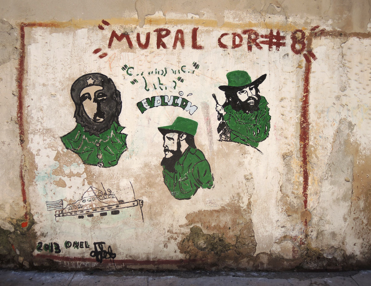 mural cdr number, portraits of three men wearing green, Che Guevera, Castro and 