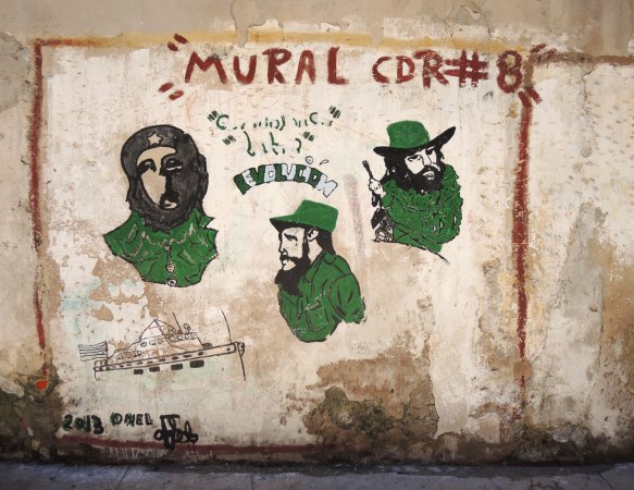 mural cdr number, portraits of three men wearing green, Che Guevera, Castro and 