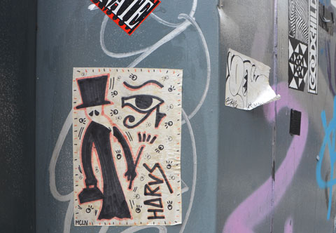 a mcln plague doctor paste up with the word horus on it as well as an eye