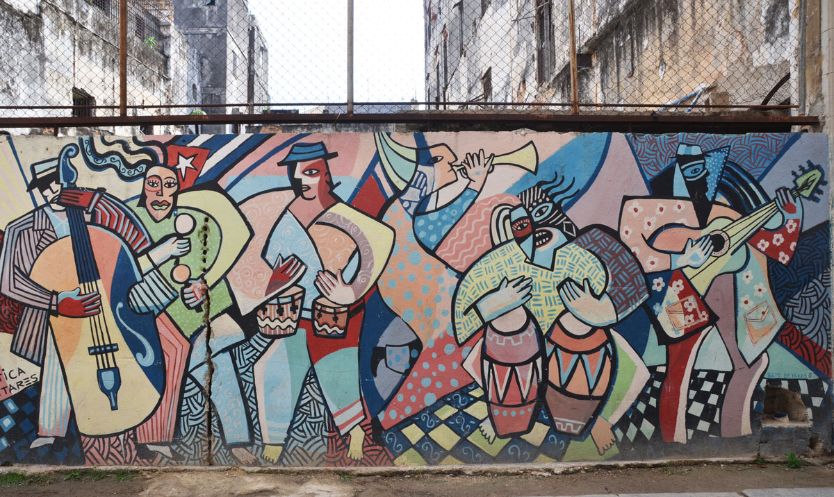 mural on a wall of a group of people, stylized slightly, obviously cuban
