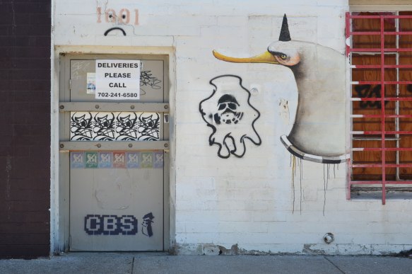 graffiti street art on a white wall -