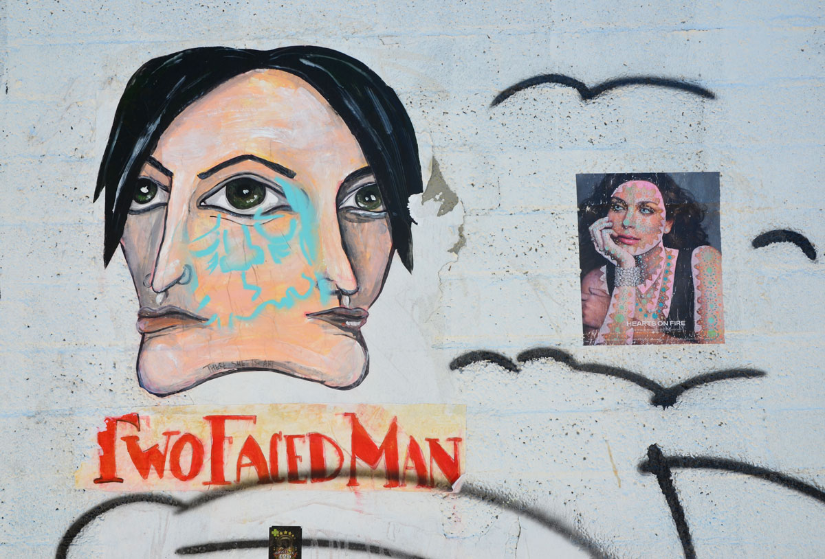 graffiti street art on a white wall -