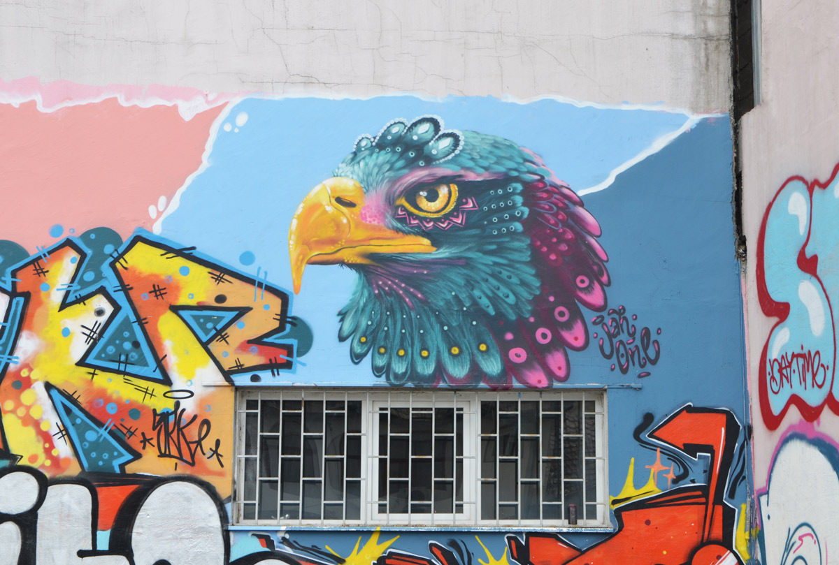 street art mural including an eagle head