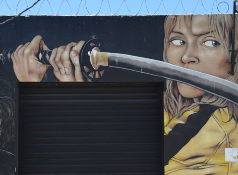 Uma Thurman wielding a sword, image from Kill Bill movie