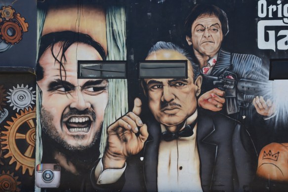 Marlon Brando as the Godfather, in a mural with other actors 