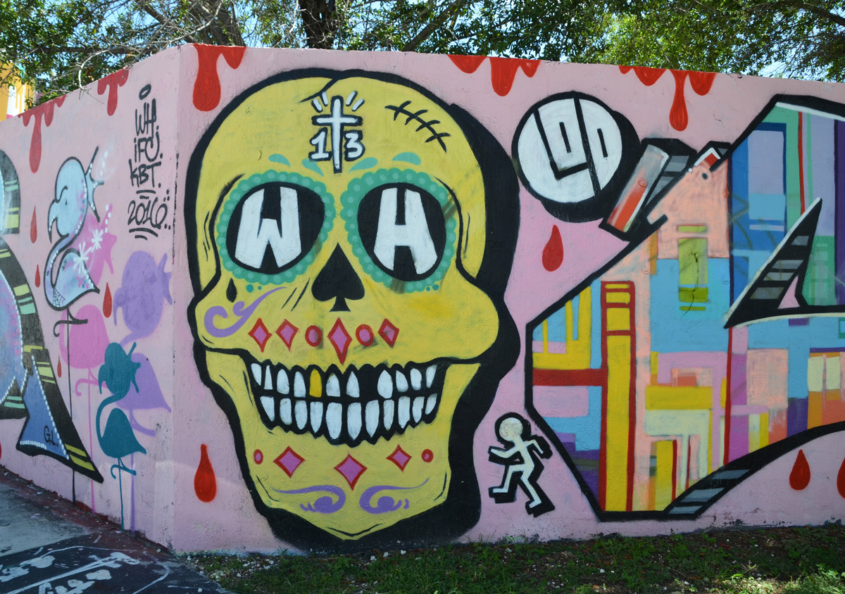 yellow decorated skull on pink horadings. 