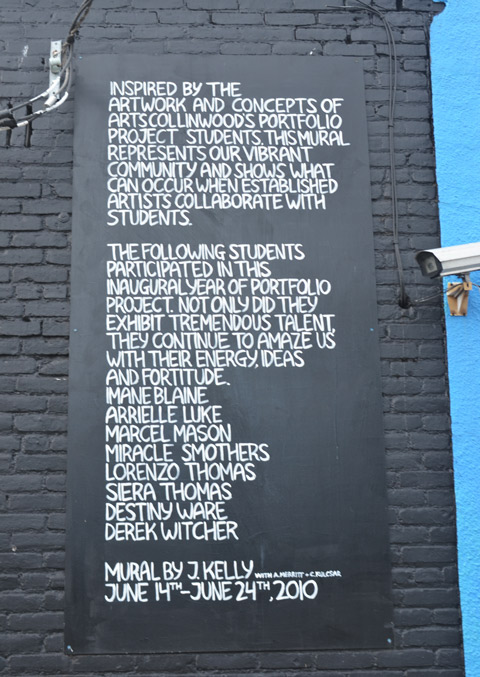 words painted on a wall beside a mural in Cleveland that thanks the people who made the mural 