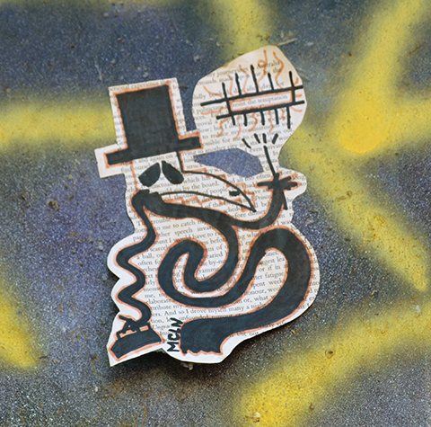 mcln pasteup of plague doctor character in black top hat