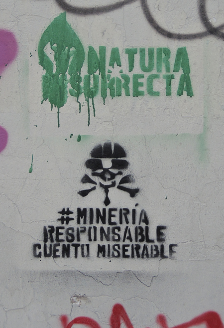 green stencil on top and black on the bottom that says mineria responsable cuentu miserable 