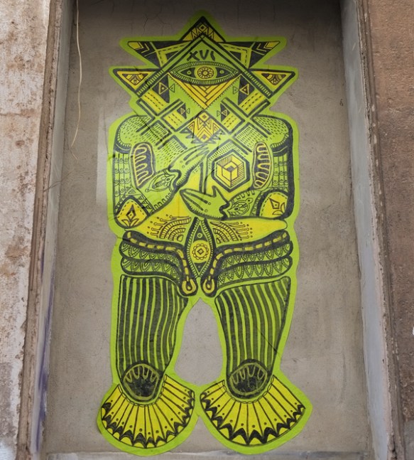 very detailed drawing, black on greens and yellows, man like figure, 