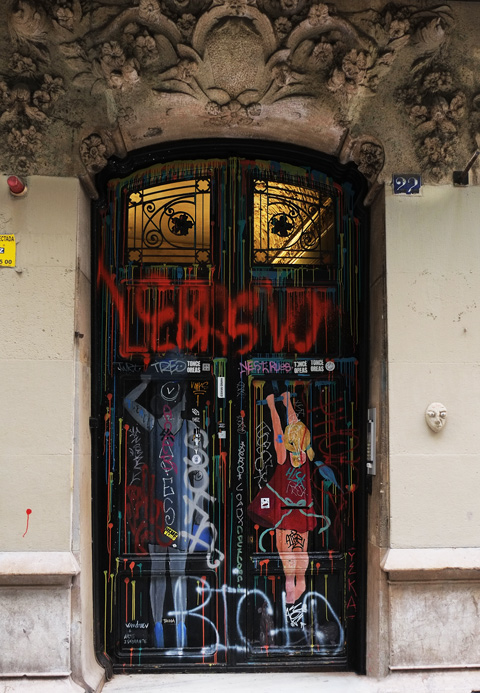 doors, wood, with two people on them, an adult and a girl 