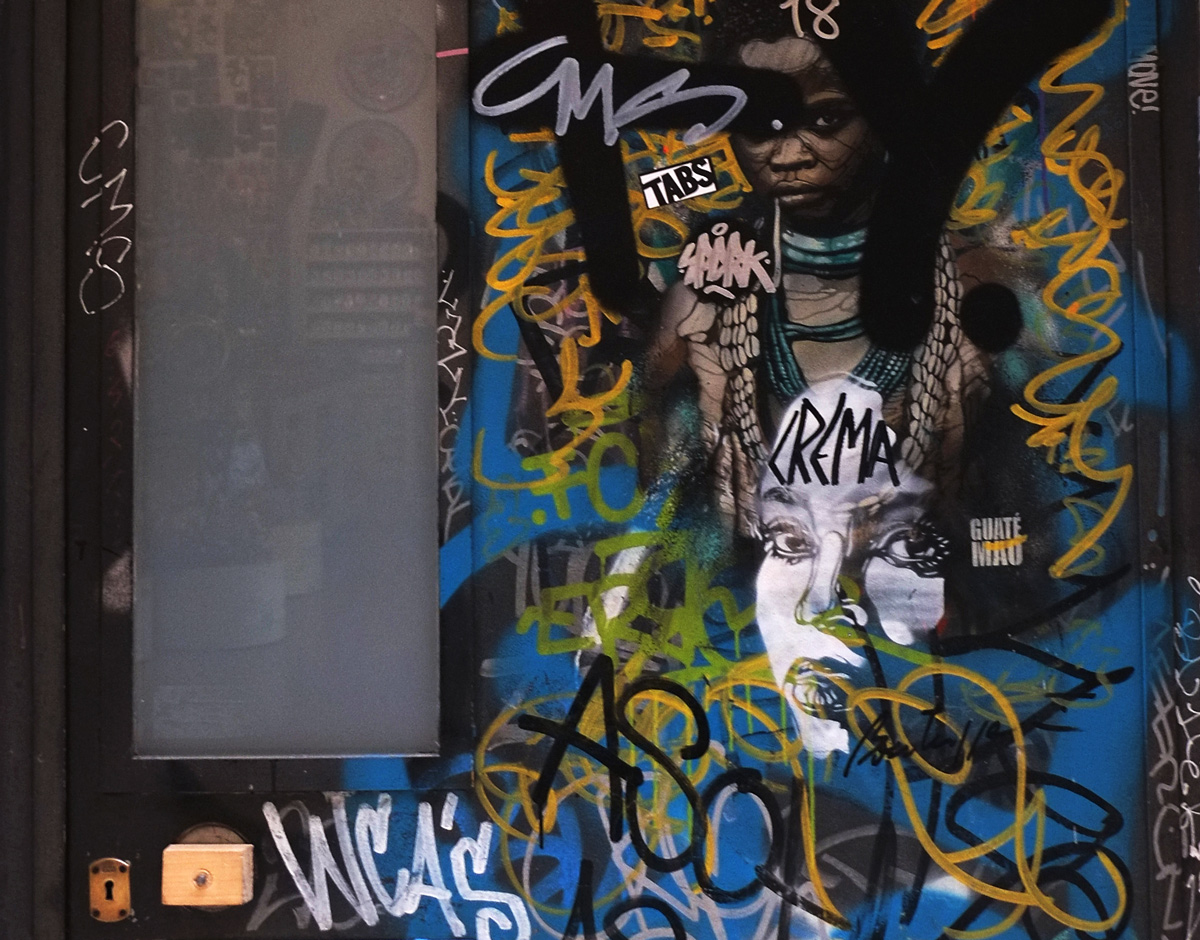 door with graffiti on it. 