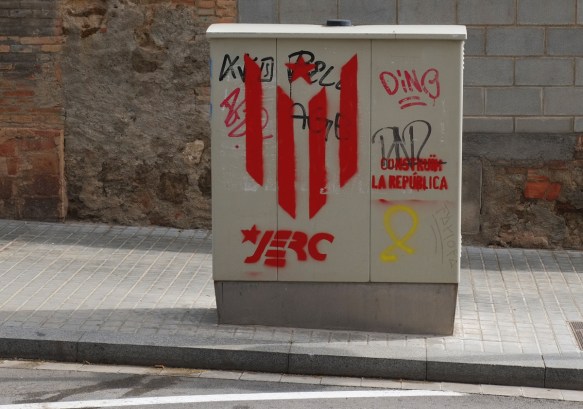 utility box with painted political statements graffiti 