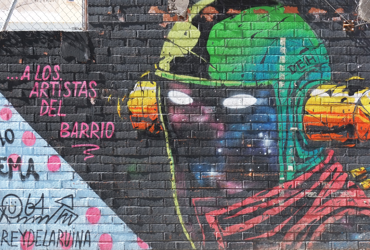 mural of a spaceman's head in a helmet 
