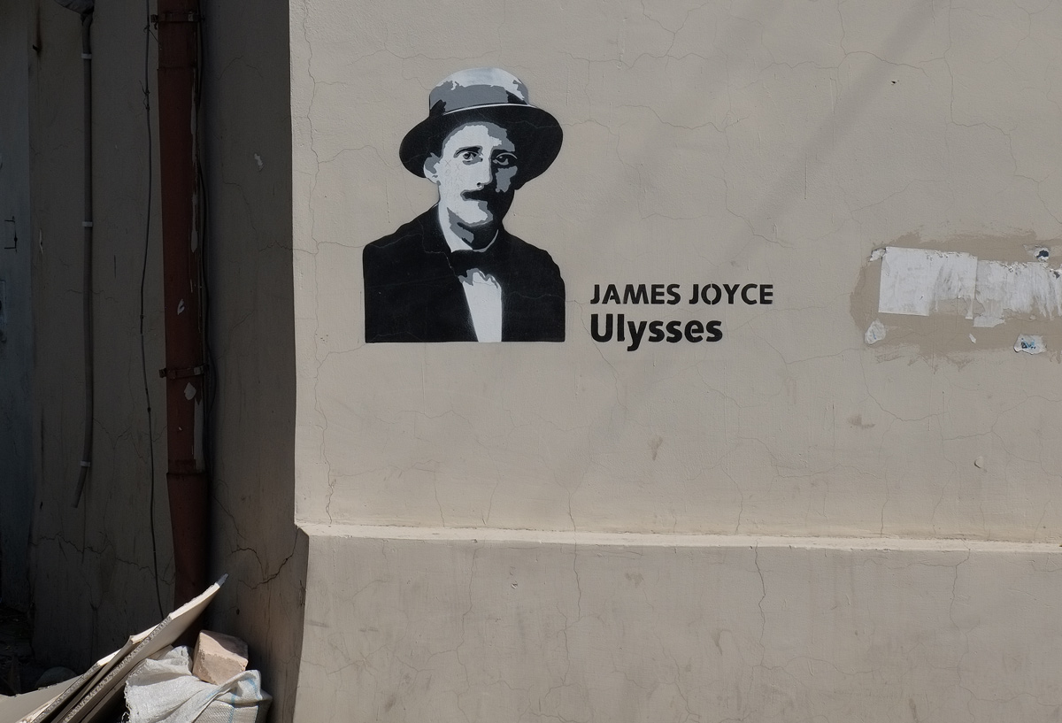 grey tones, black and white portrait of James Joyce who wrote Ulysses