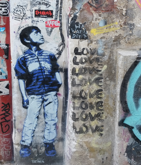 paste-up of boy in nlue jacket by @tona_one