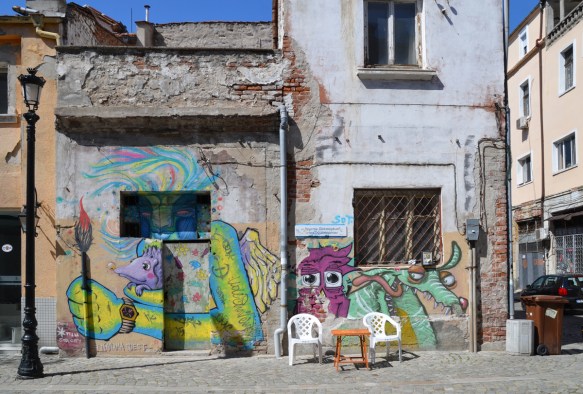murals by stern on the side of an old building in Plovdiv 