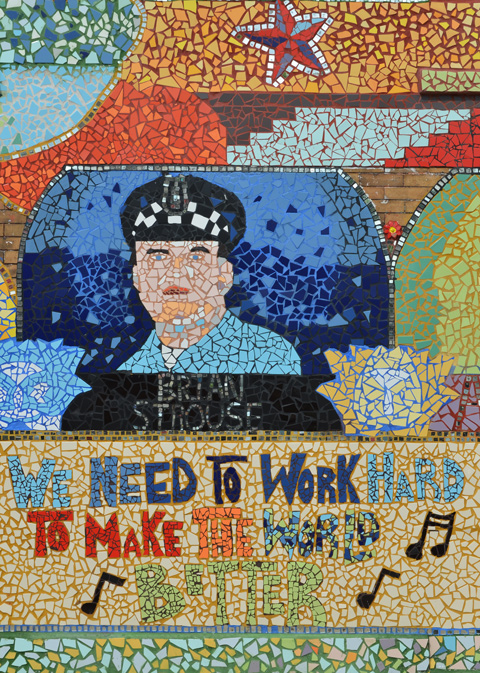 mosaic tribute to policeman, Brian Strouse, along with the words we need to work hard to make the world better 