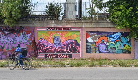 warrior city tribe mural on a wall on Wood street in Pilsen 