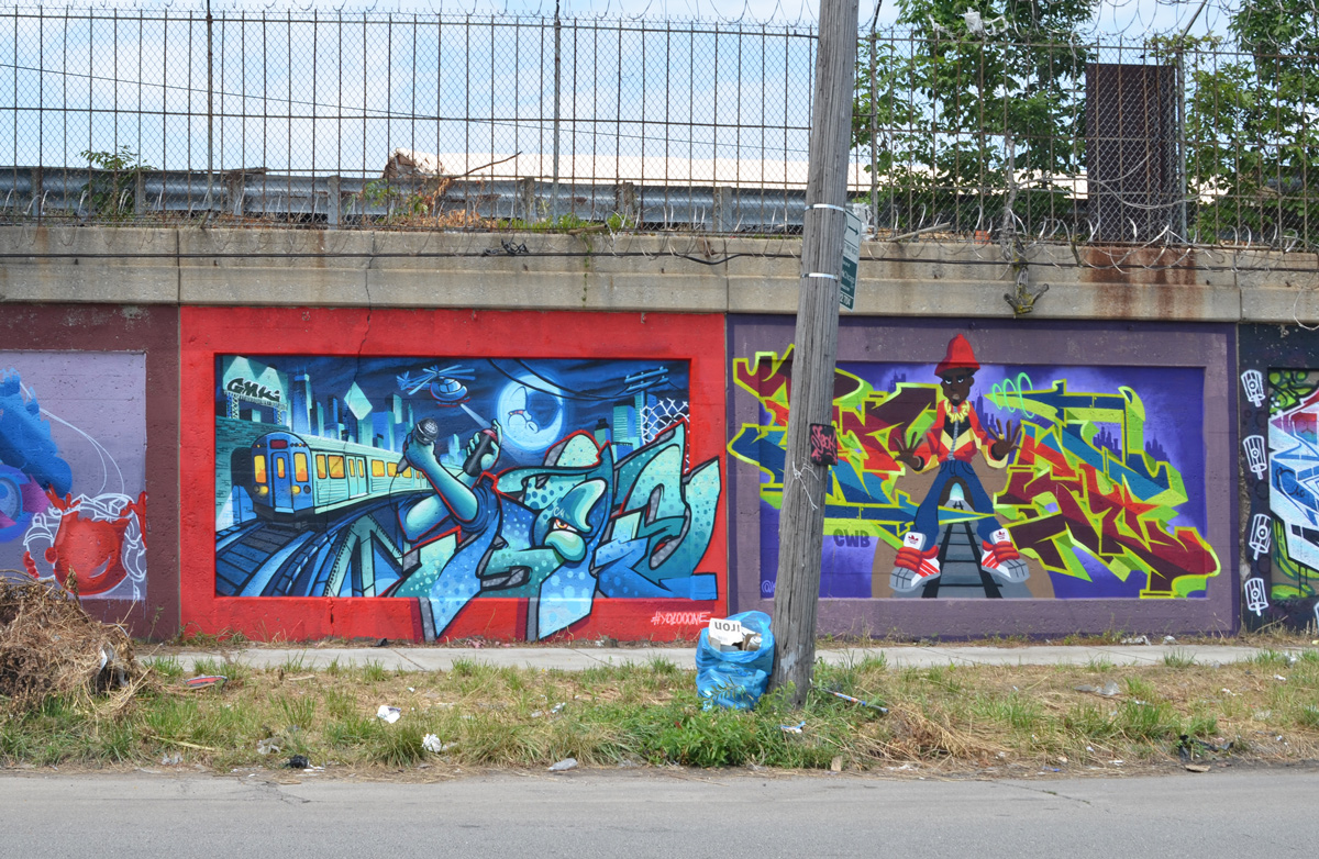 two murals on a wall 