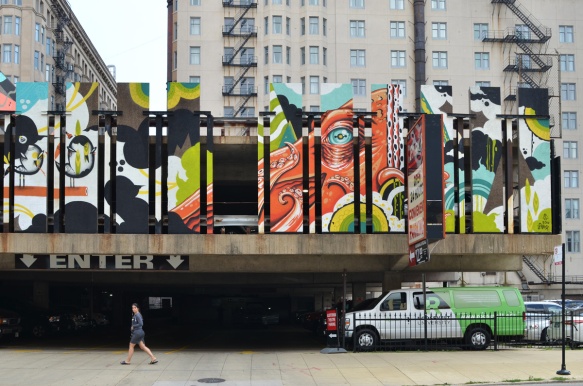 walls of an elevated parking structure painted in an octopus mural 