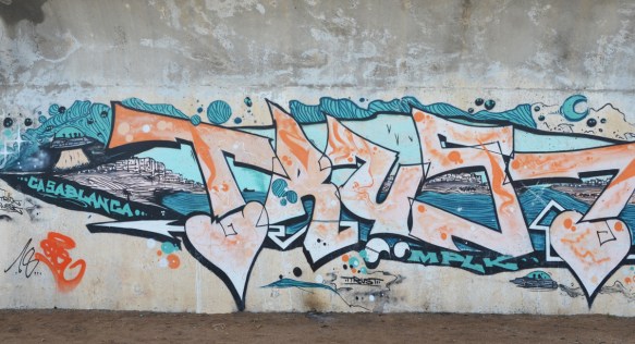 text graffiti by trust also with word casablanca and some scenes from that city 