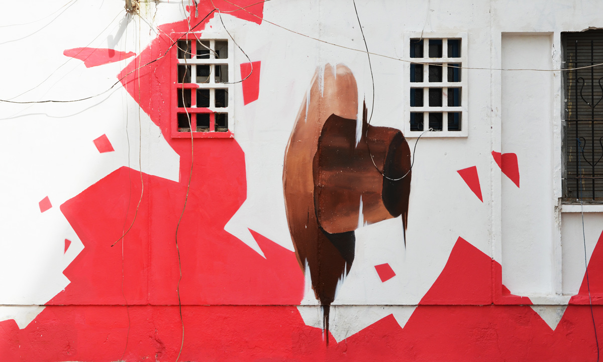 part of a mural by oldr, a brown hat falling