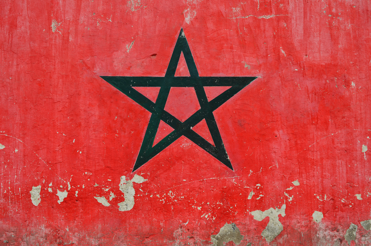 part of a series of murals on a Casablanca wall, a green star on a red background