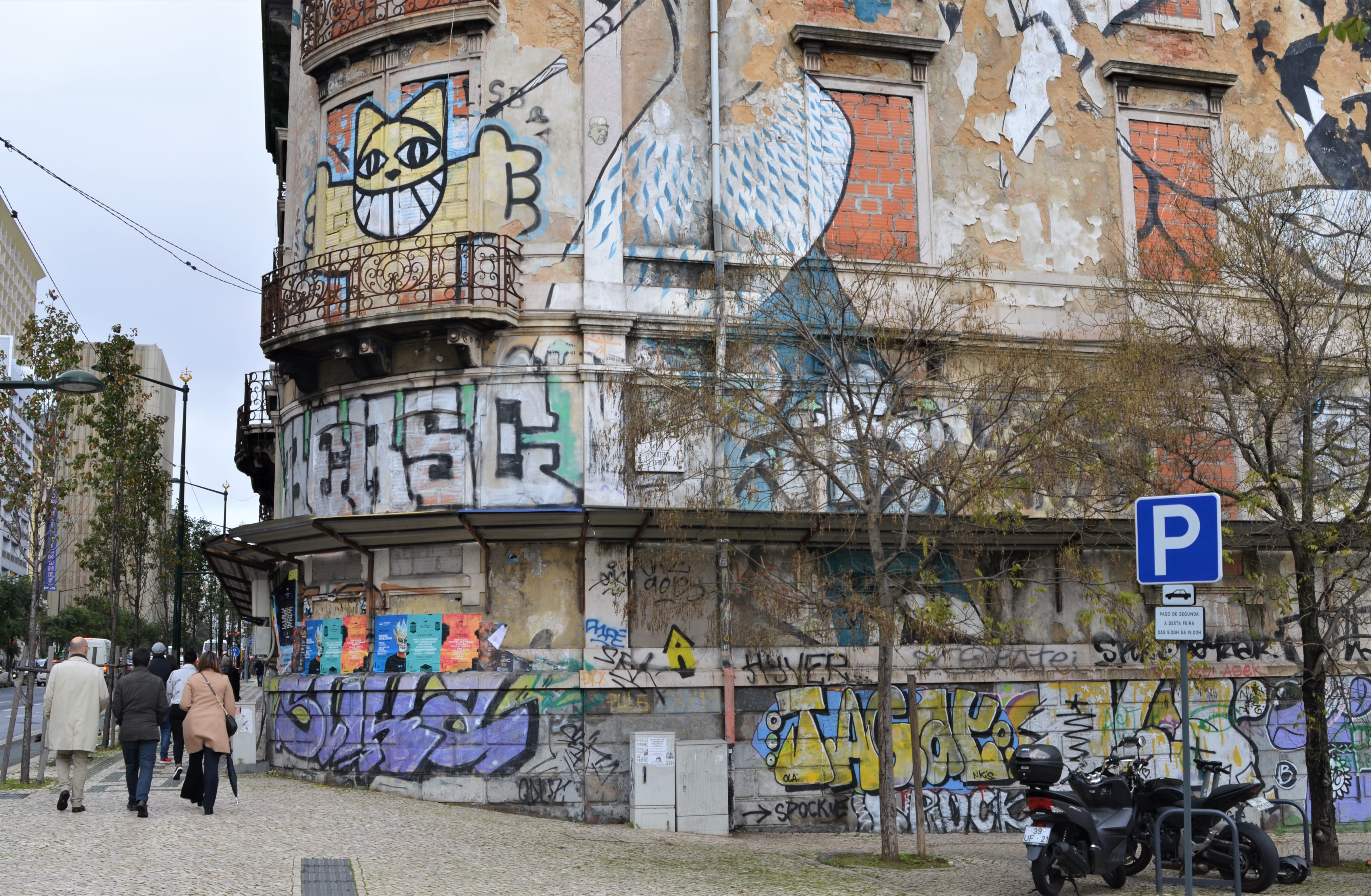 abandoned building in Lisboa covered with murals and graffiti