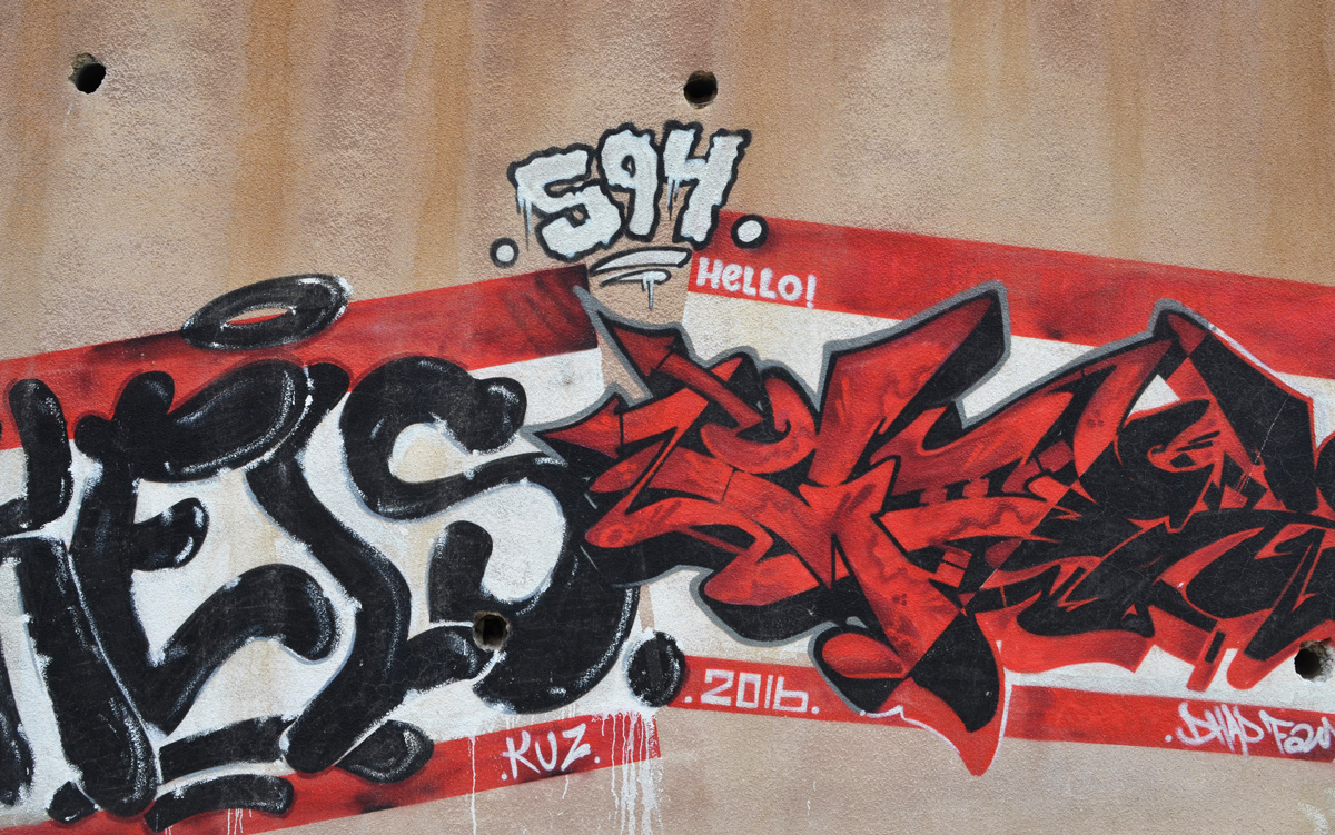 part of a series of hello my name is name tag based street art