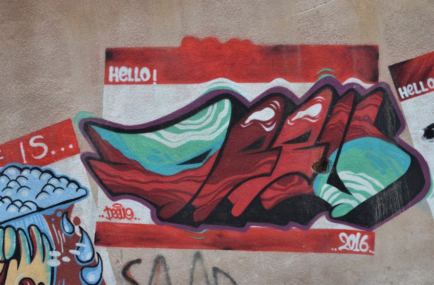 part of a series of hello my name is name tag based street art