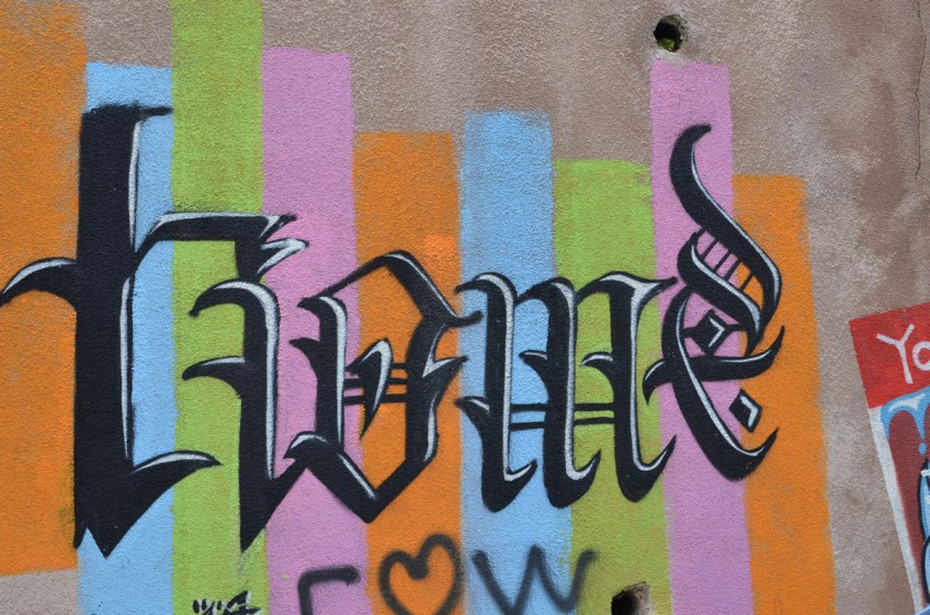 part of a series of hello my name is name tag based street art