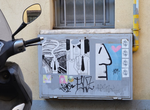 paste ups on a metal box in the street in Rome