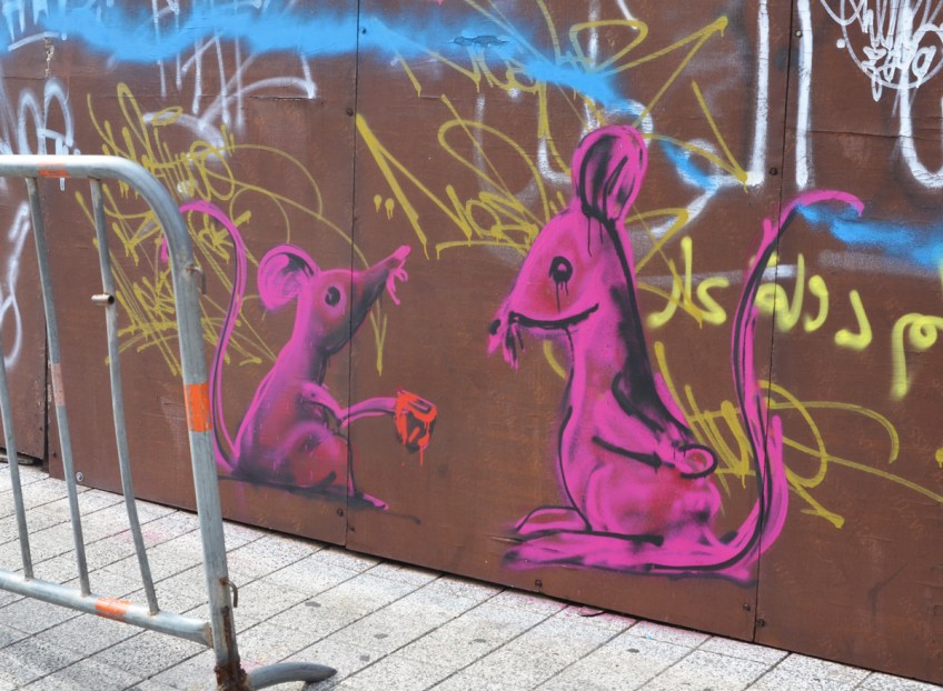 two pink mice painted on a wall in Beirut
