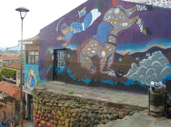 mural by einer, a man is being thrown from a horse