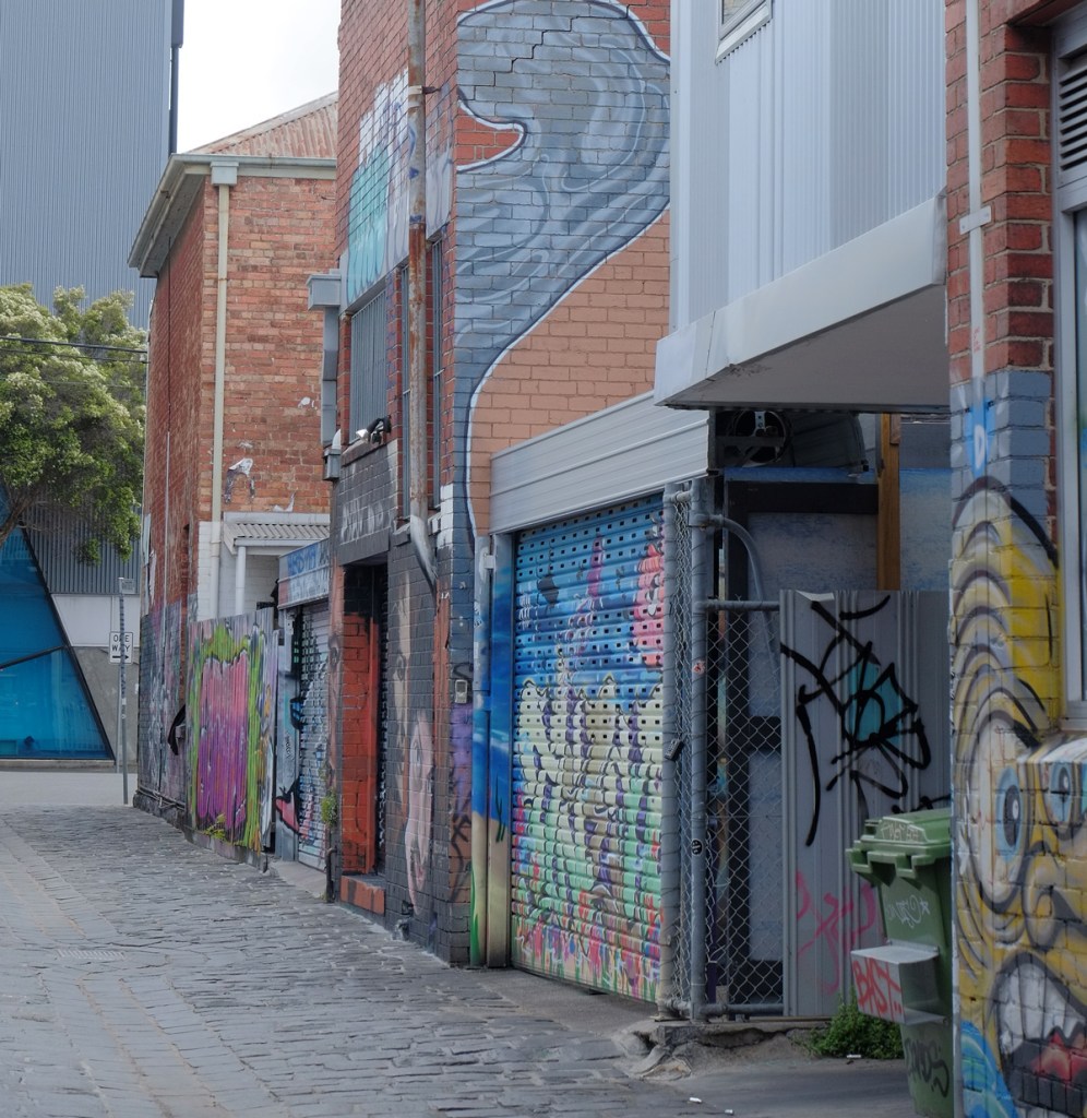 Artist Lane, Windsor, Melbourne with street art on garages and walls
