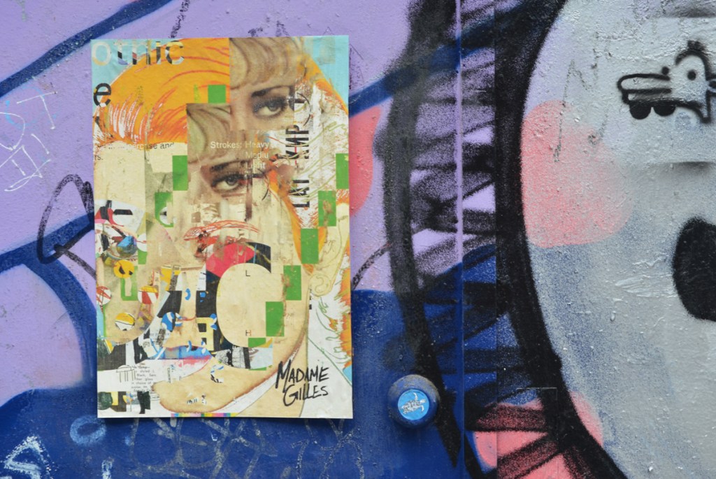 poster sized graffiti on a wall in Montreal, collage of different pictures to form abstract womans face, by Madame Gilles