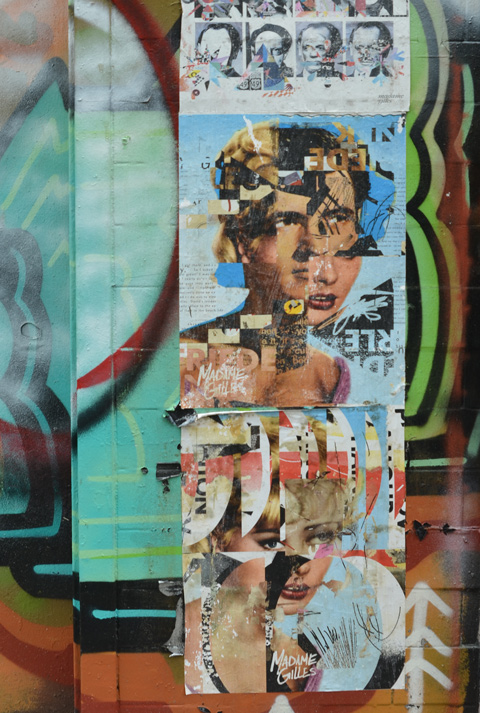 pasteups on a door in Montreal