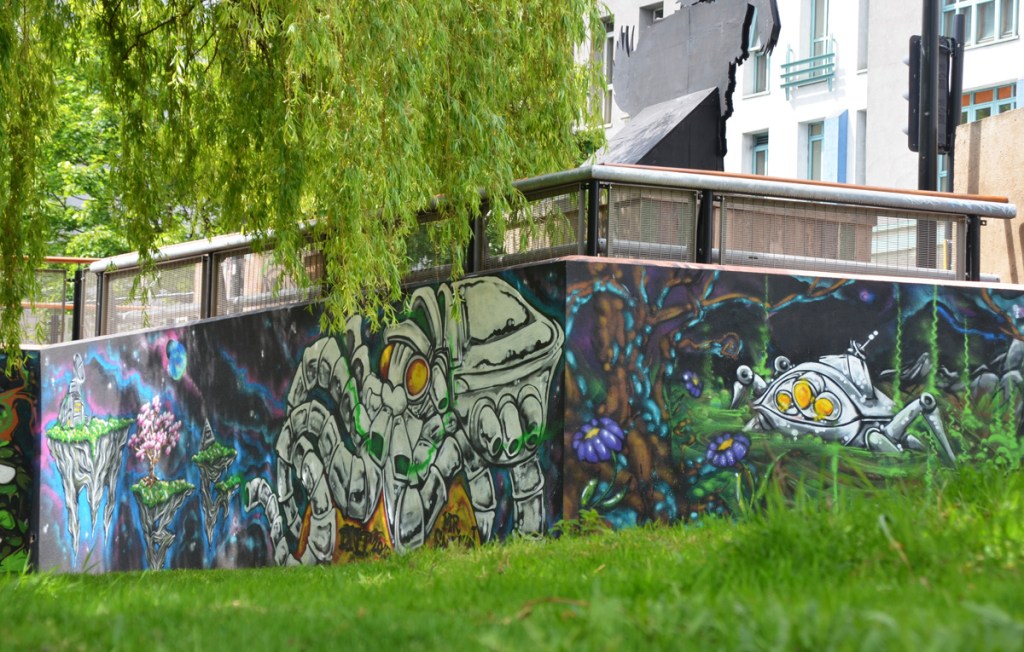street art wall with imaginative and creative space aliens and creatures