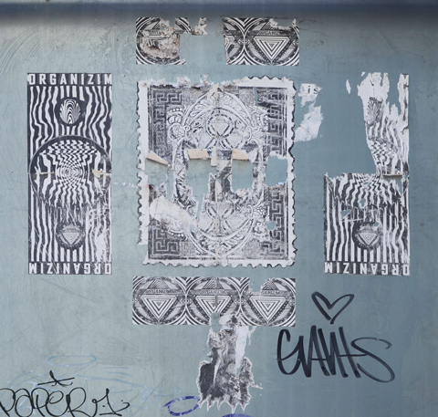 paper pasteups, partially peeling